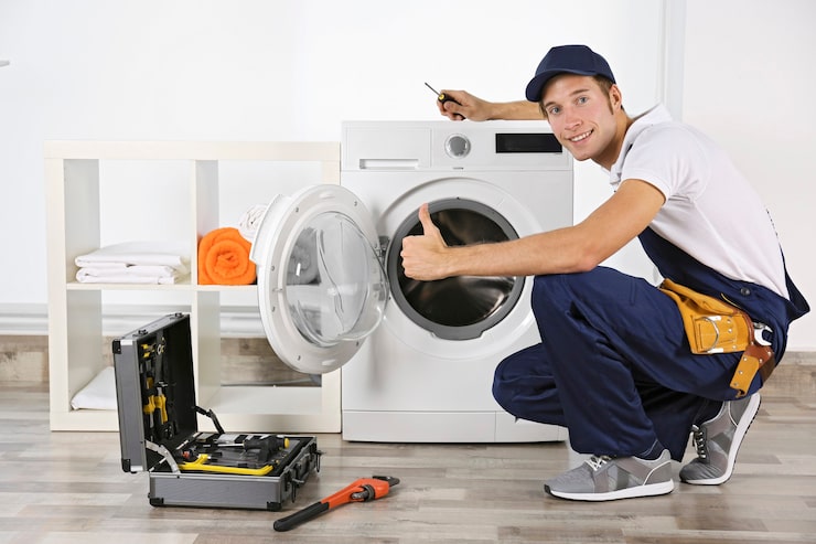 plumber-repairing-washing-machine_392895-4242 plumber-repairing-washing-machine_392895-4242